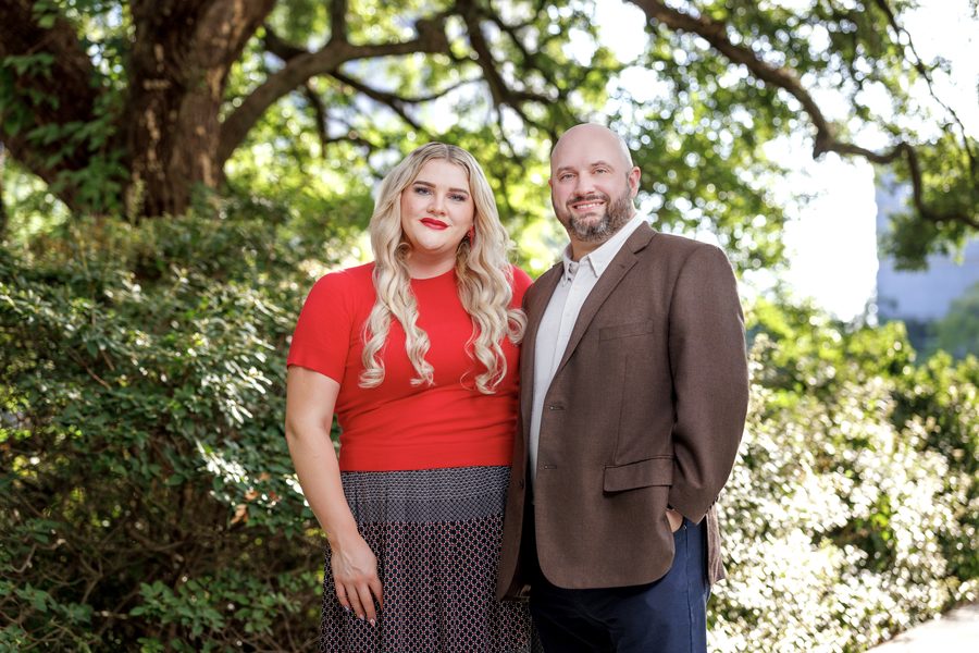 Michael Vincent and his wife Brianna under live oaks
